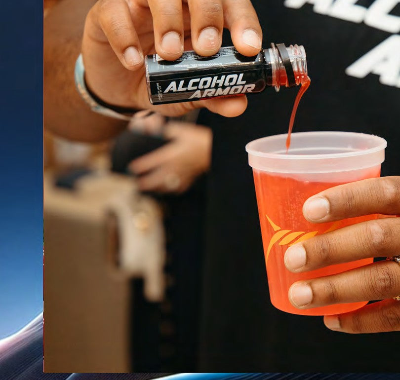 Pouring the shot into a mixed drink